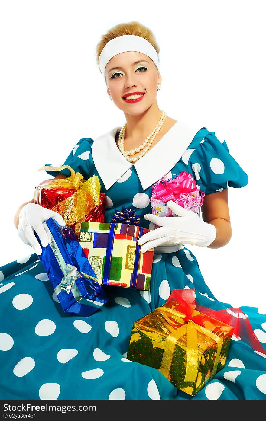 Young woman with colorful gifts isolated on a white background