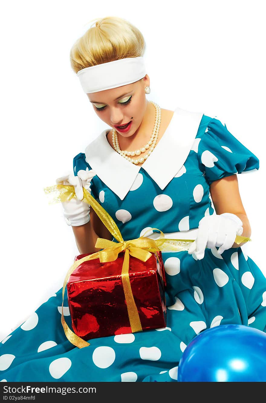 Young woman with colorful gifts isolated on a white background