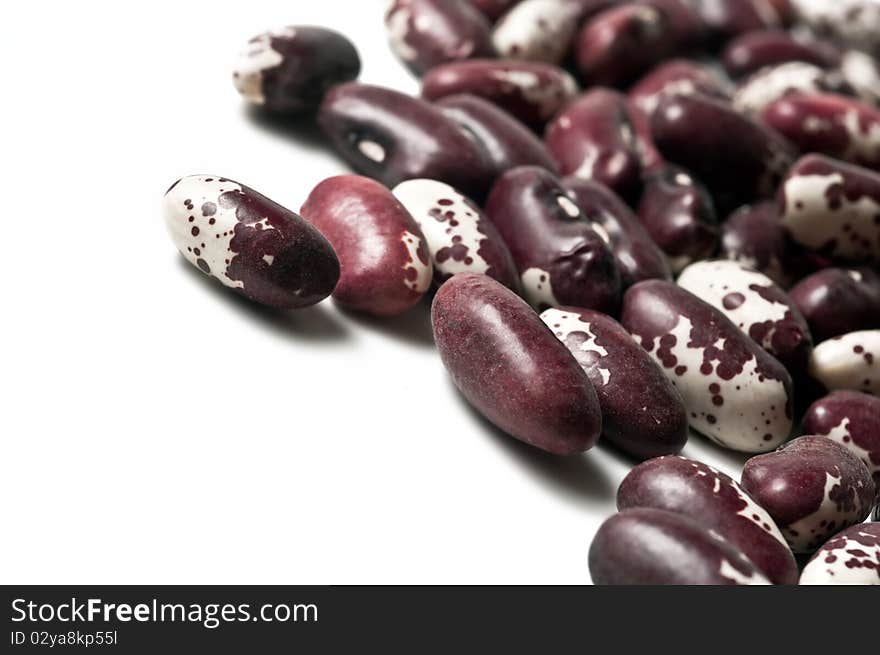 Beans close-up isolated in a white background