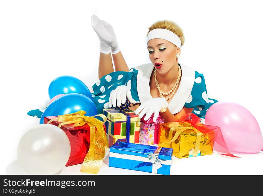 Young woman with colorful gifts isolated on a white background