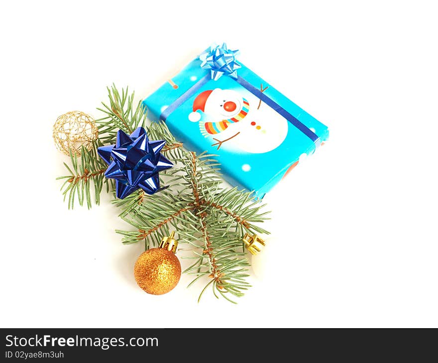 Christmas gift with a decoration on white background