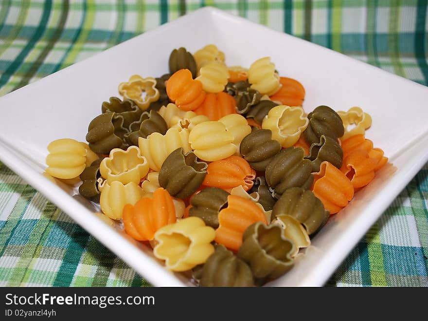 Italian pasta with vegetables. Dry pasta ready to cook.