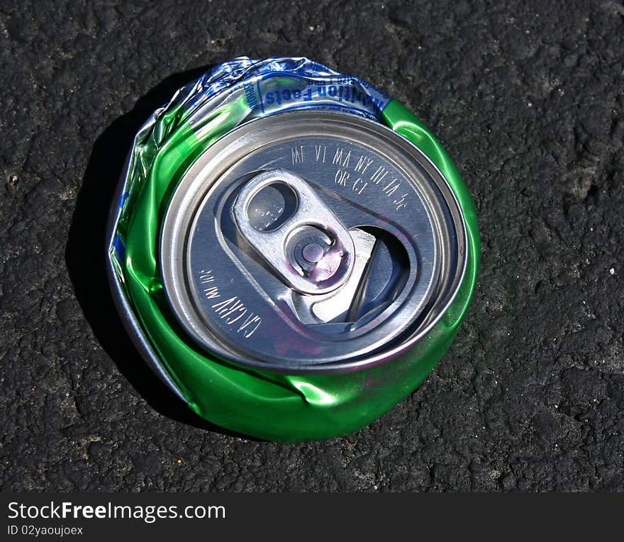 Top view of crushed aluminum soda can