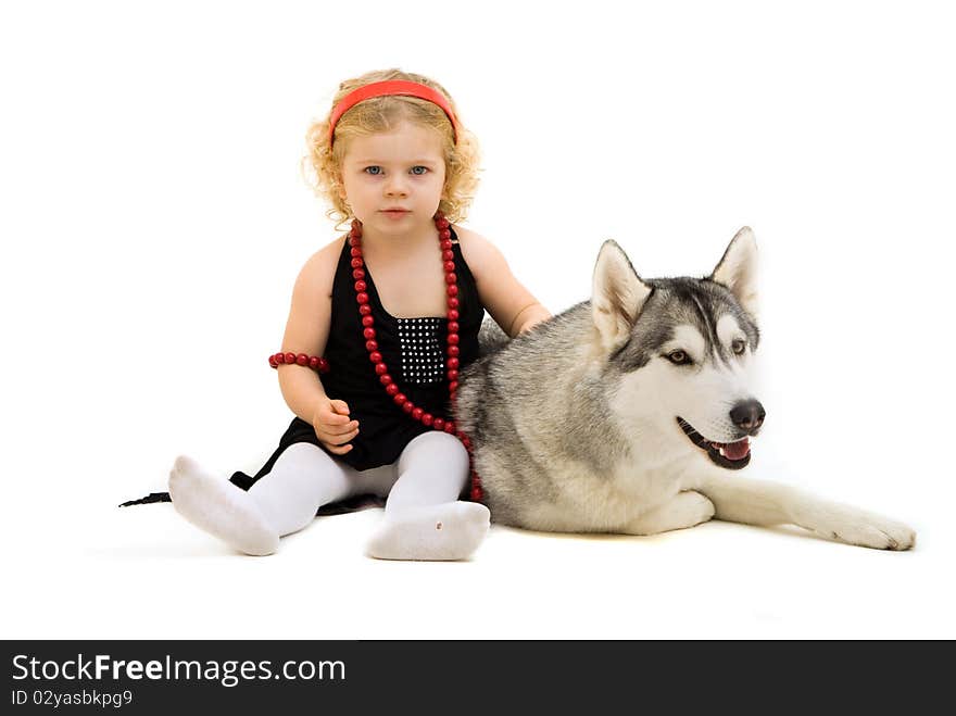 Child playing with dog isolated on white