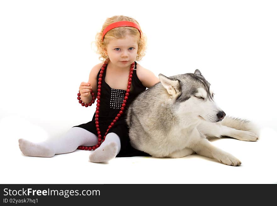 Child playing with dog isolated