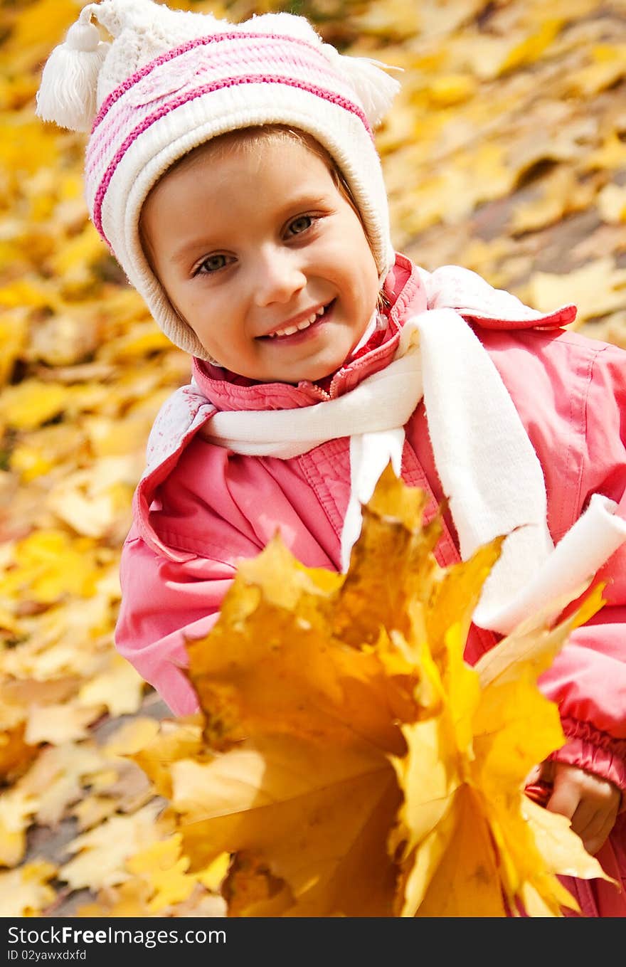 Autumn portrait of cute little caucasian girl