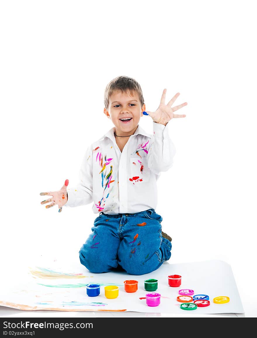 Adorable 3 year old boy covered in bright paint. Adorable 3 year old boy covered in bright paint.