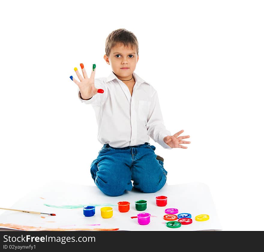 Adorable 3 year old boy covered in bright paint. Adorable 3 year old boy covered in bright paint.