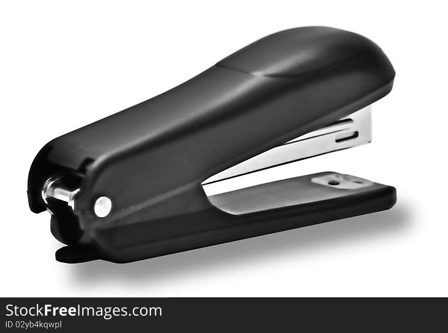 Black office stapler isolated over white background