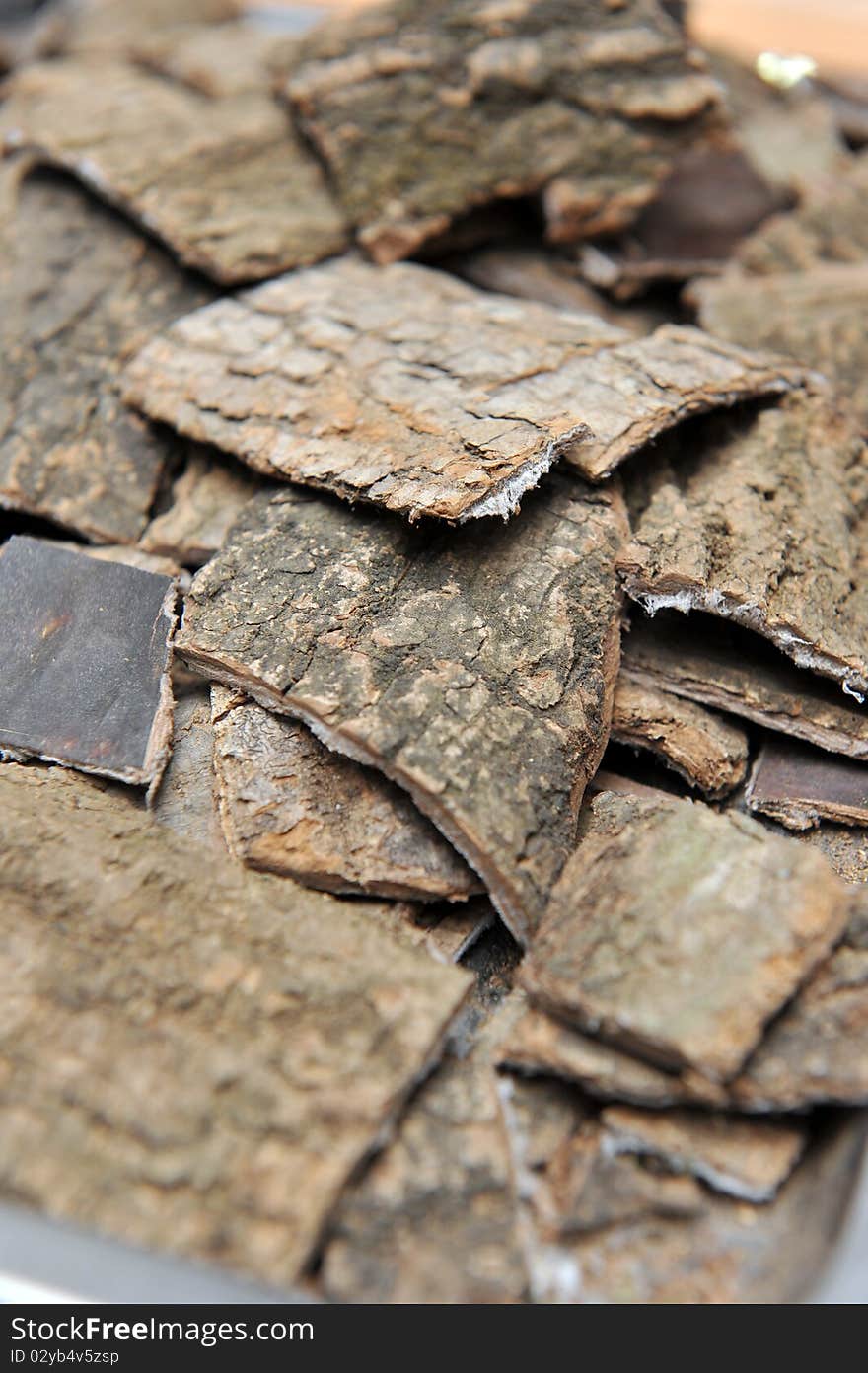 A Pile Of Chinese Herb name Du Zhong.