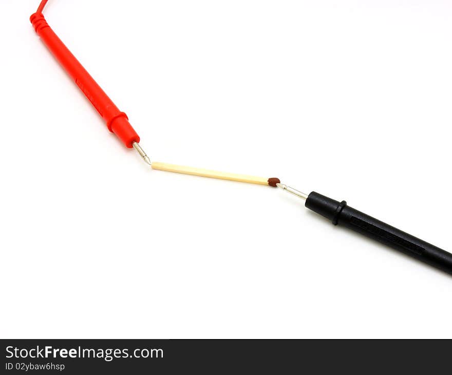 Multimeter of black color with a red and black wire on a white background