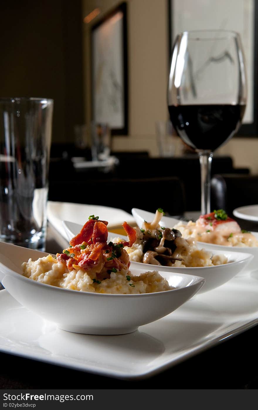 Grits with bacon, mushroom, and lobster. Grits with bacon, mushroom, and lobster