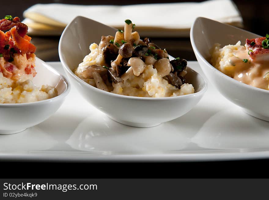 Grits with bacon, mushroom, and lobster. Grits with bacon, mushroom, and lobster