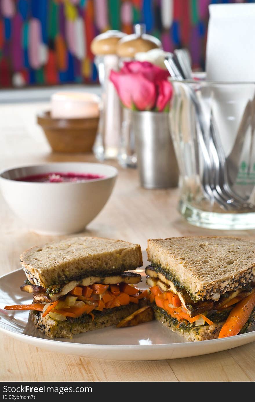 Carrot and tofu sandwich with basil spread on wheat bread