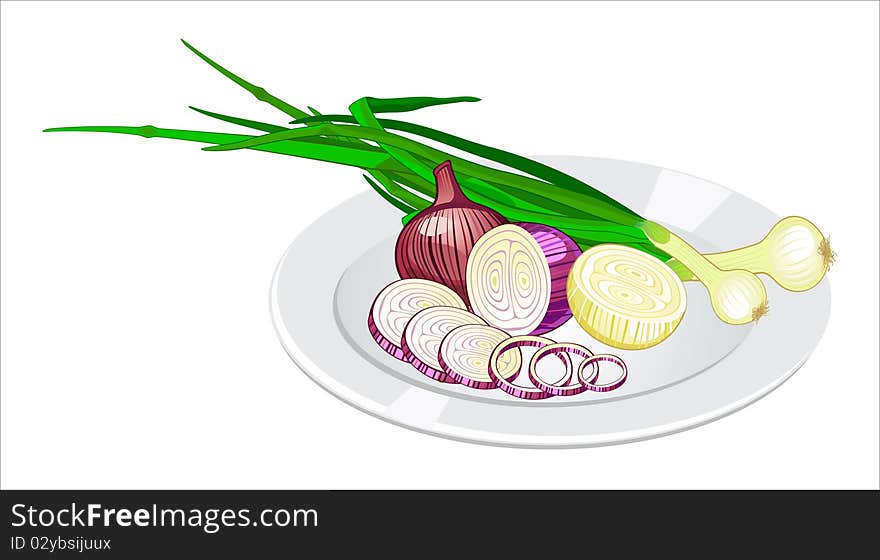 Cloves of onion, sliced and green onion on the plate