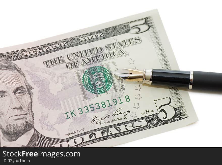 Dollar banknotes and pen