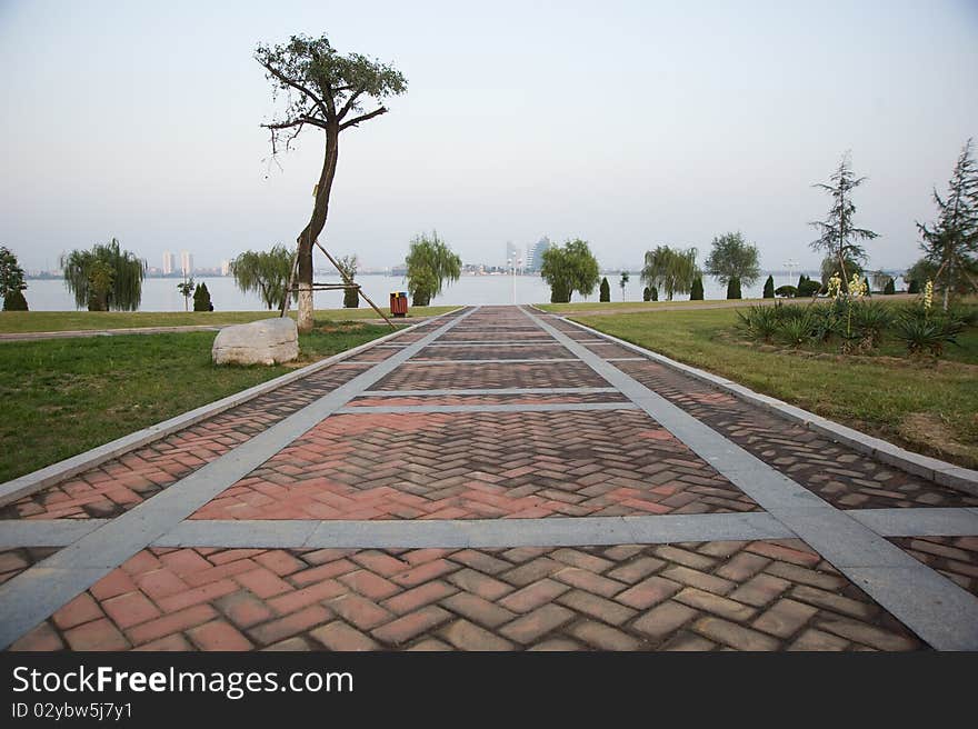 Red stone path at the park of nice city france. Red stone path at the park of nice city france