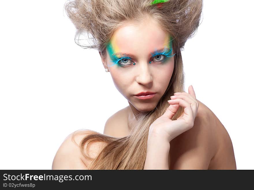 Beautiful woman  with color makeup over white background