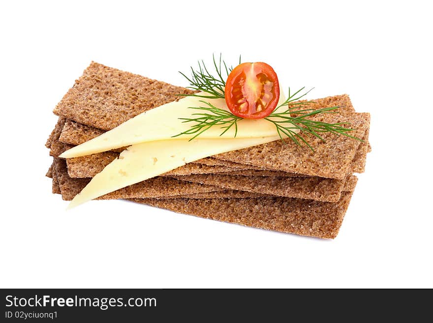 Crispbread with cheese, tomato and dill isolated on white. Healthy breakfast.