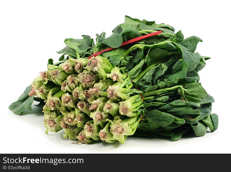 Spinach isolated on white with natural shadows