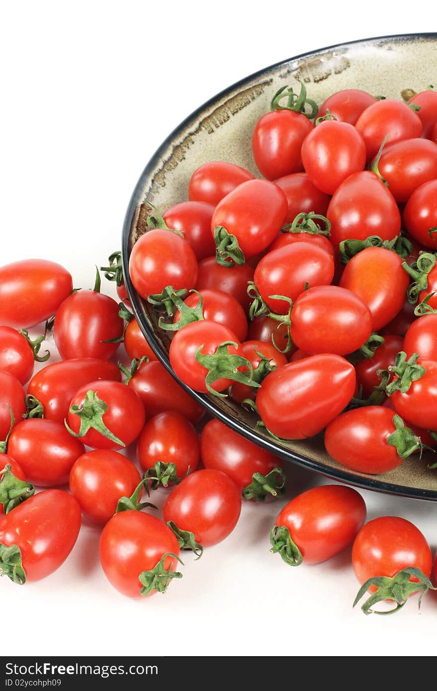 Cherry tomatoes on white background