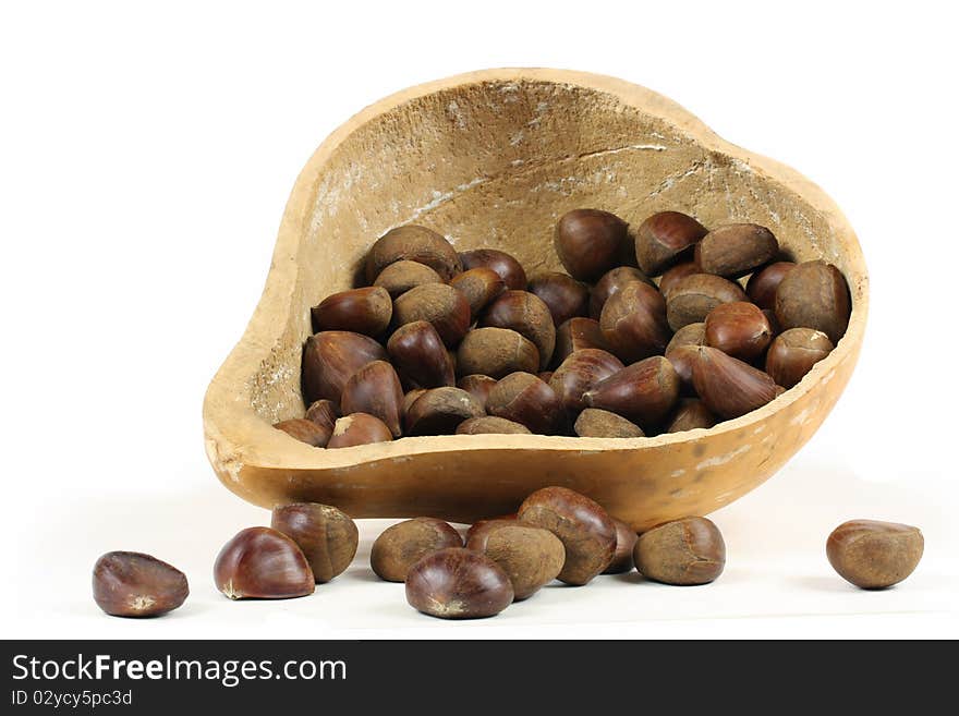 Installed in the ladle in the chestnuts in a white background