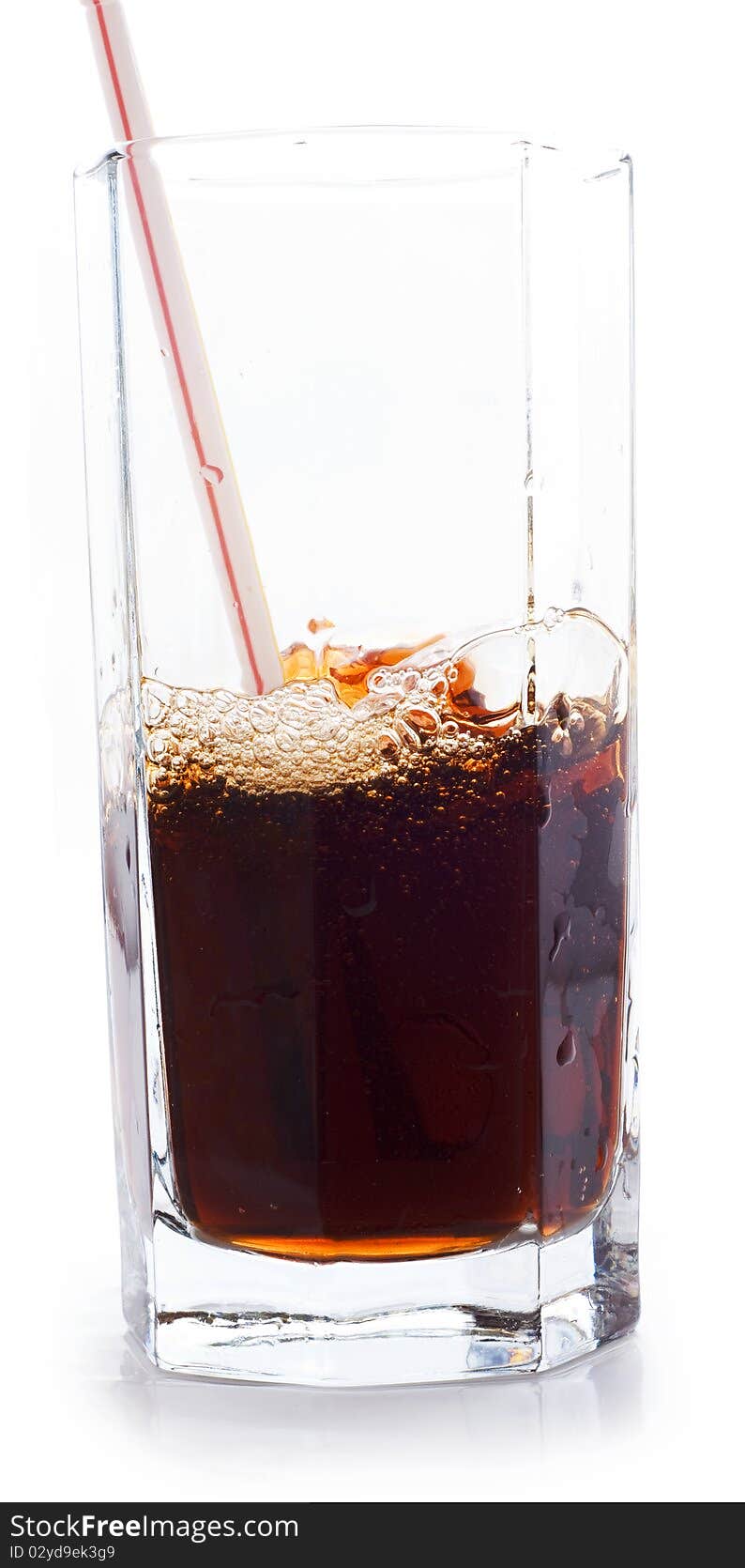 Soda in a glass, a white background