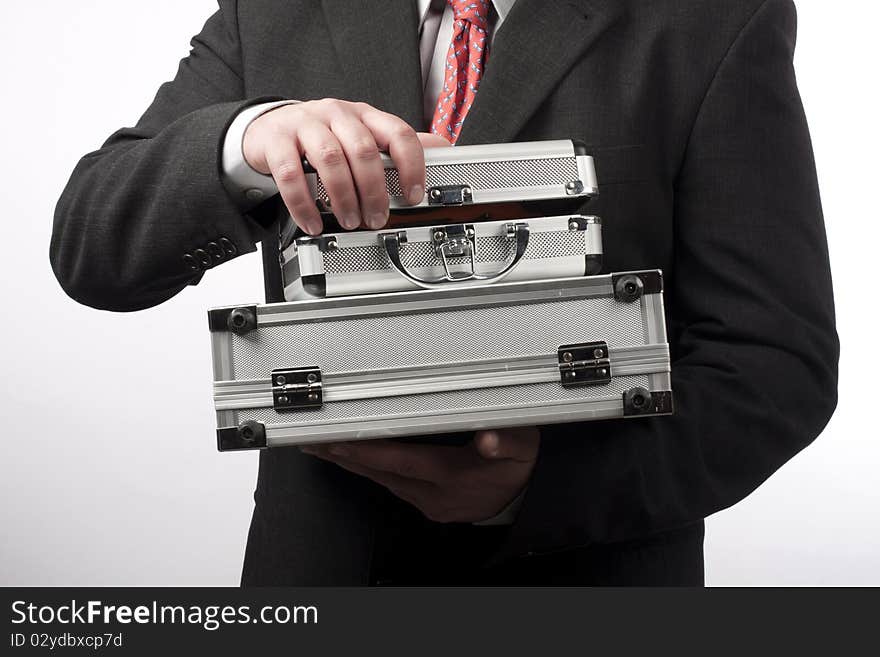 Man with two metal suitcases