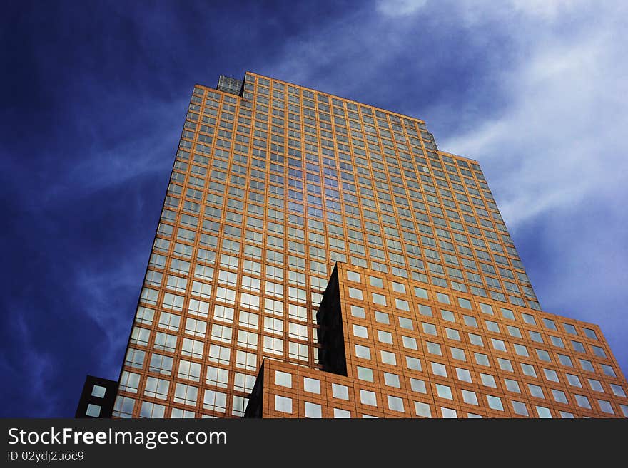 Skyscrapers building in down town Manhattan in the blue sunny sky