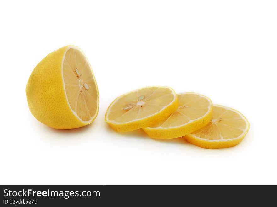 Chopped lemon slices on white background