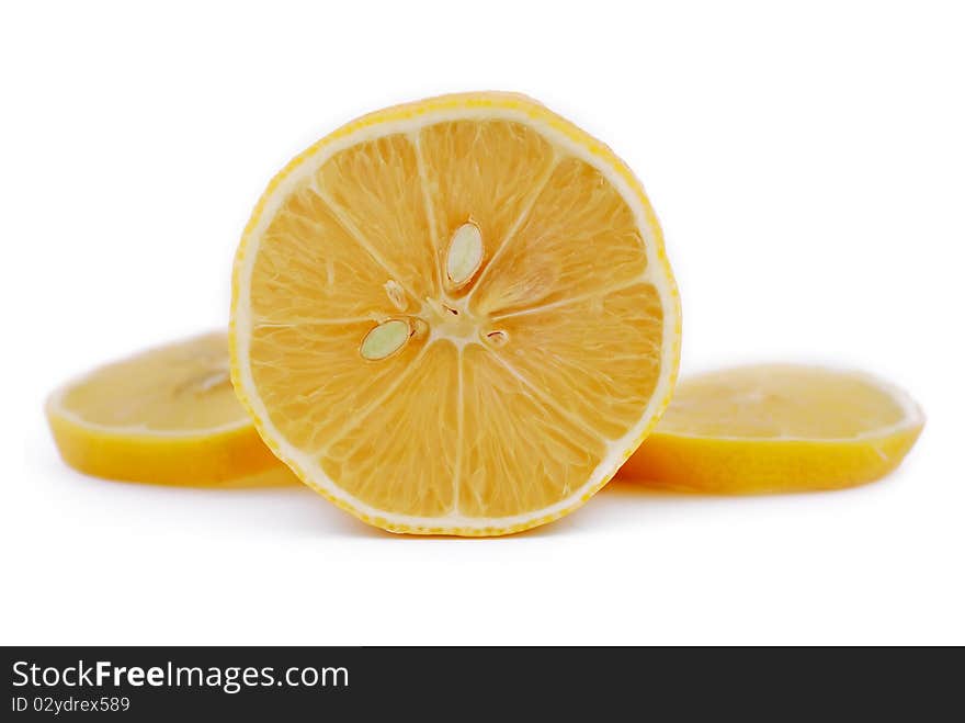 Chopped lemon slices on white background