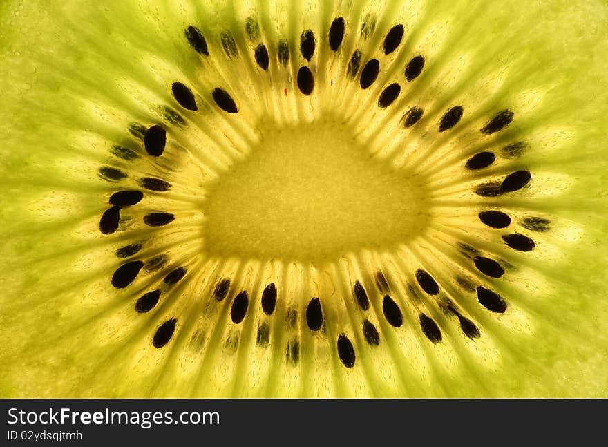 Cut of the cut fruit kiwi, photographed close up (macro).