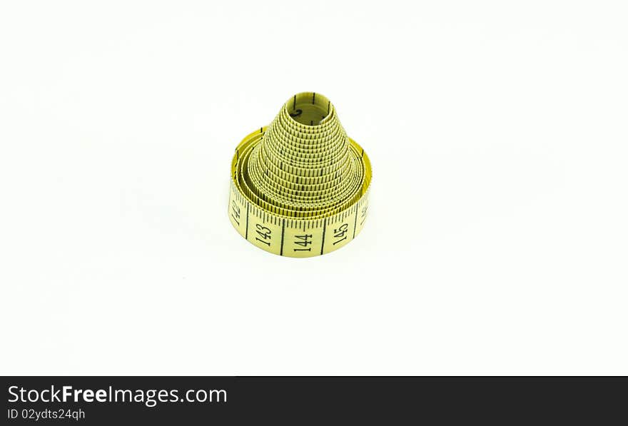 Yellow measuring tape isolated on white background