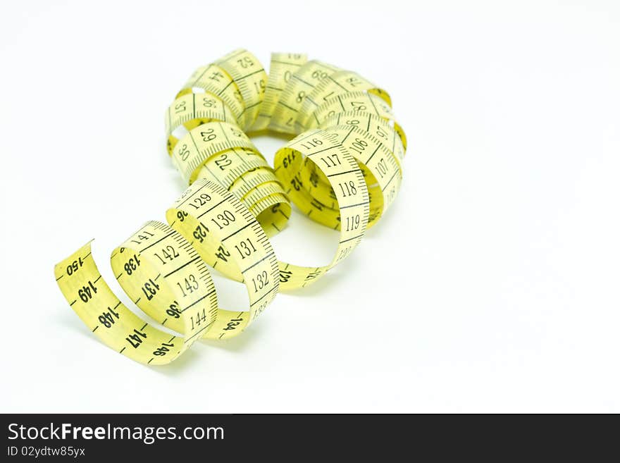 Yellow measuring tape isolated on white background