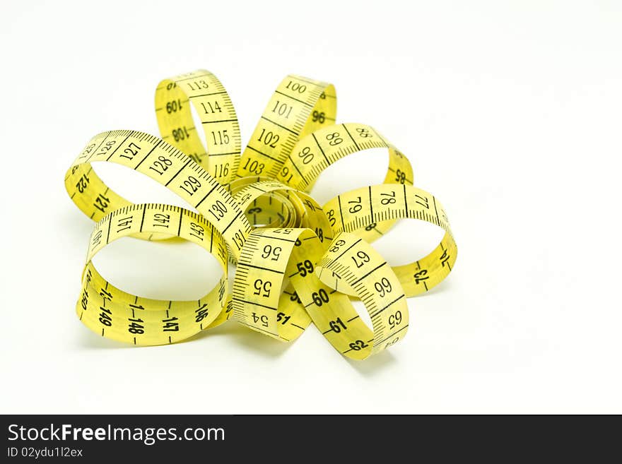 Yellow measuring tape isolated on white background