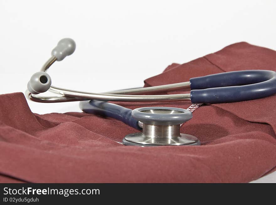 This image shows a stethoscope on a gown