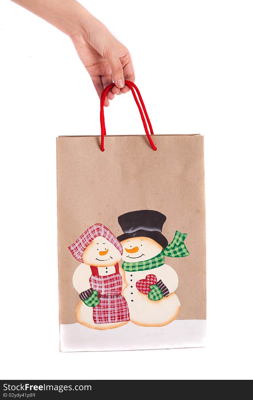 Holdingn christmas bags