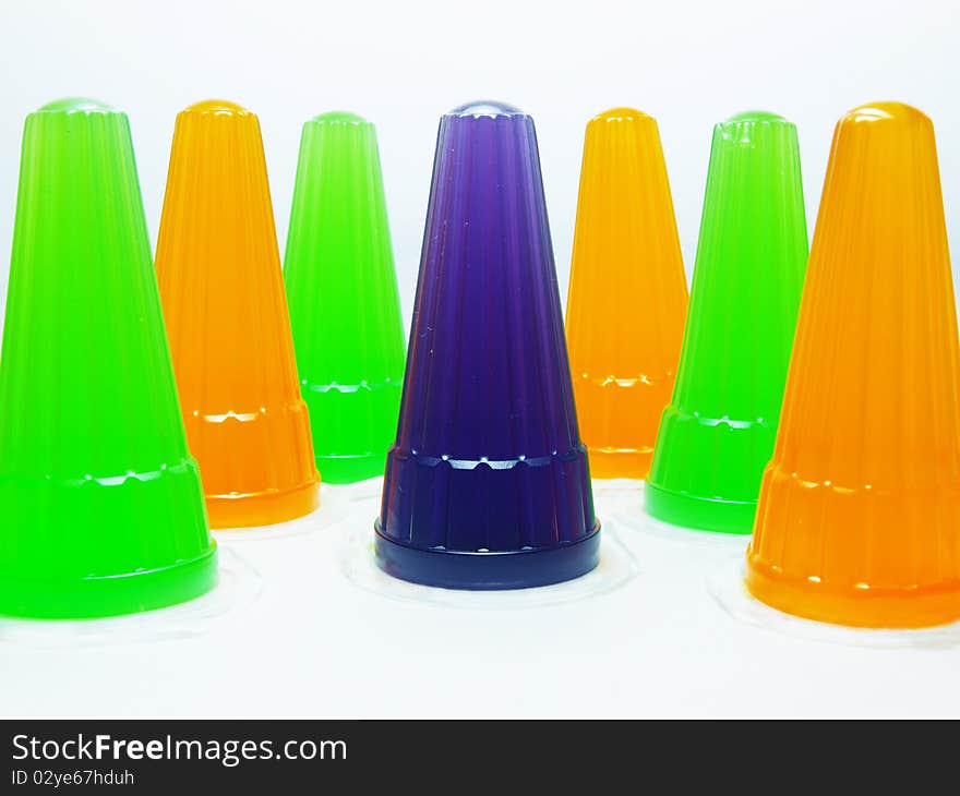 Colorful sweet jelly line up on a white background.