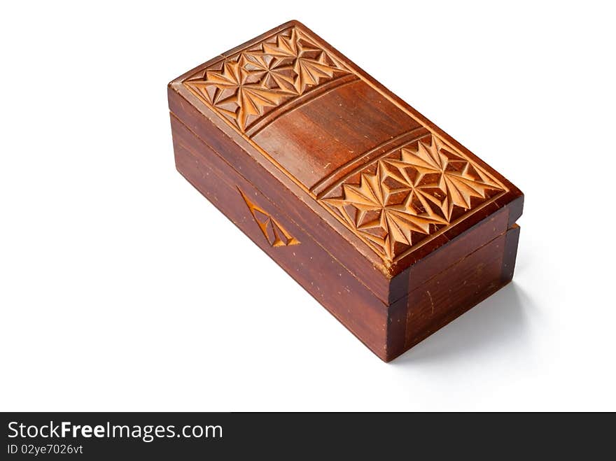 An old vintage wooden box with carved patterns