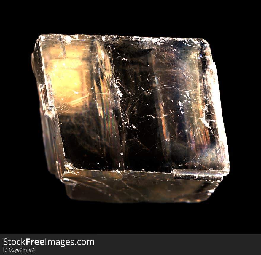 Mineral iceland spar isolated on the black background