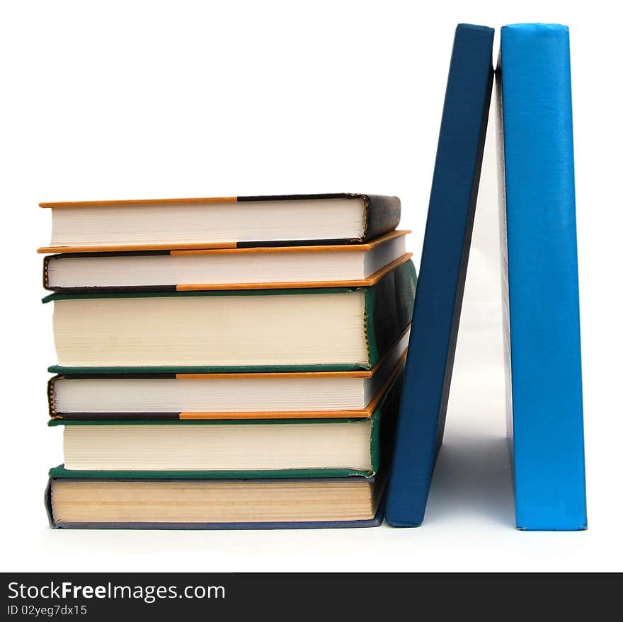 The learning textbooks on white table. The learning textbooks on white table