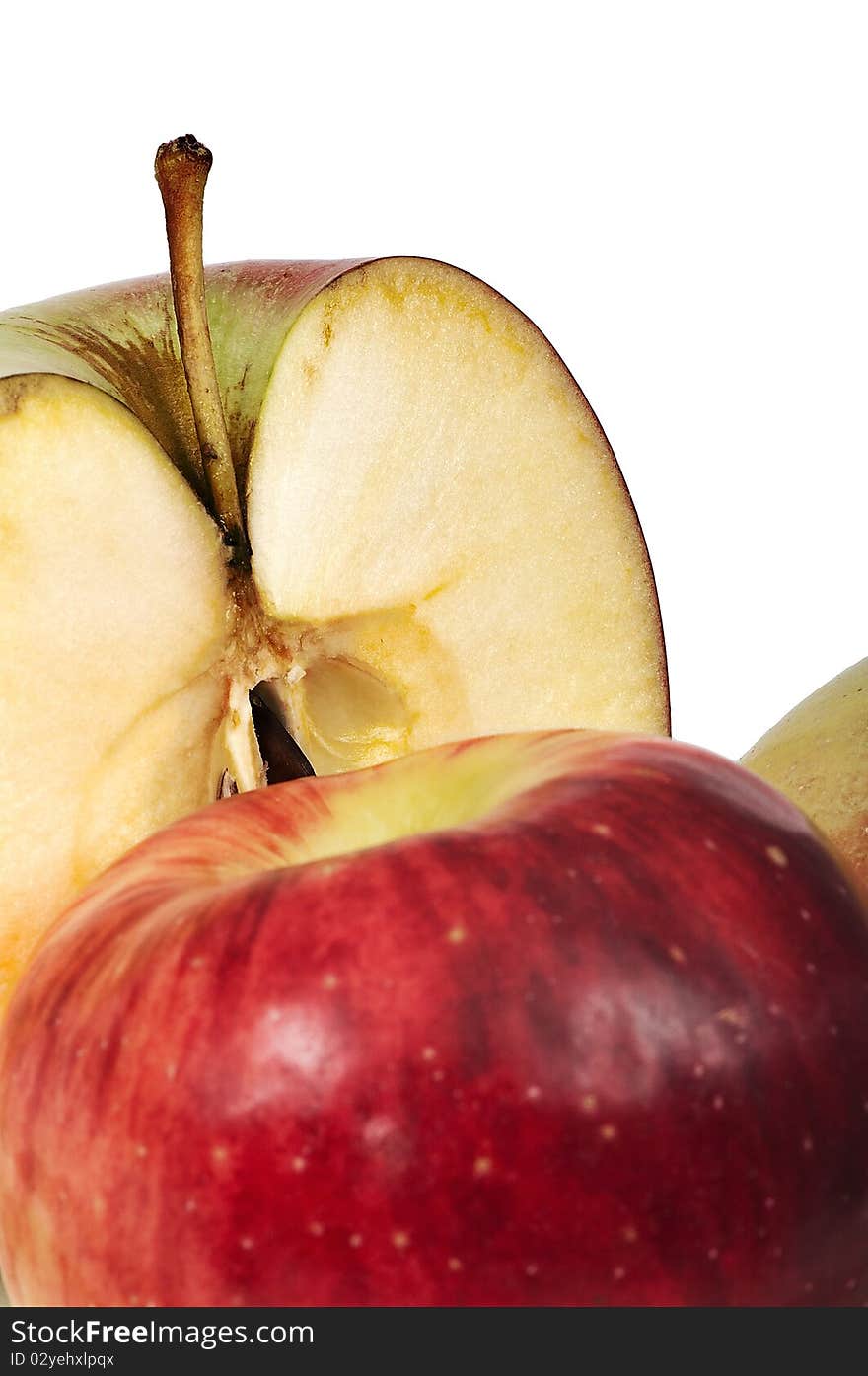 Cut red apple isolated over white background