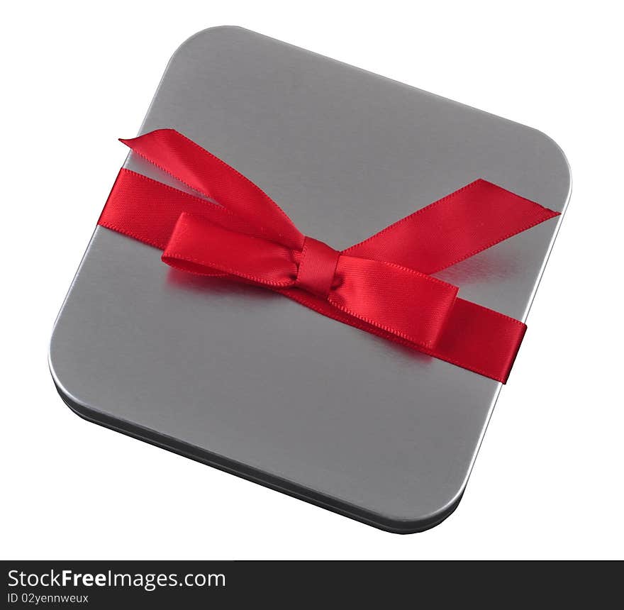 A gift with a red ribbon on top.