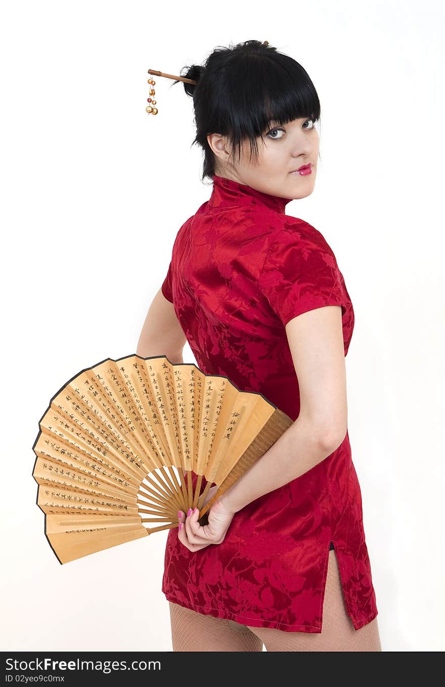 Portrait of girl in geisha costume isolated on white