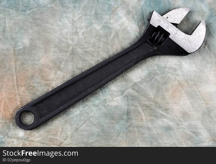 A Shifting (adjustable wrench) photographed in a studio.