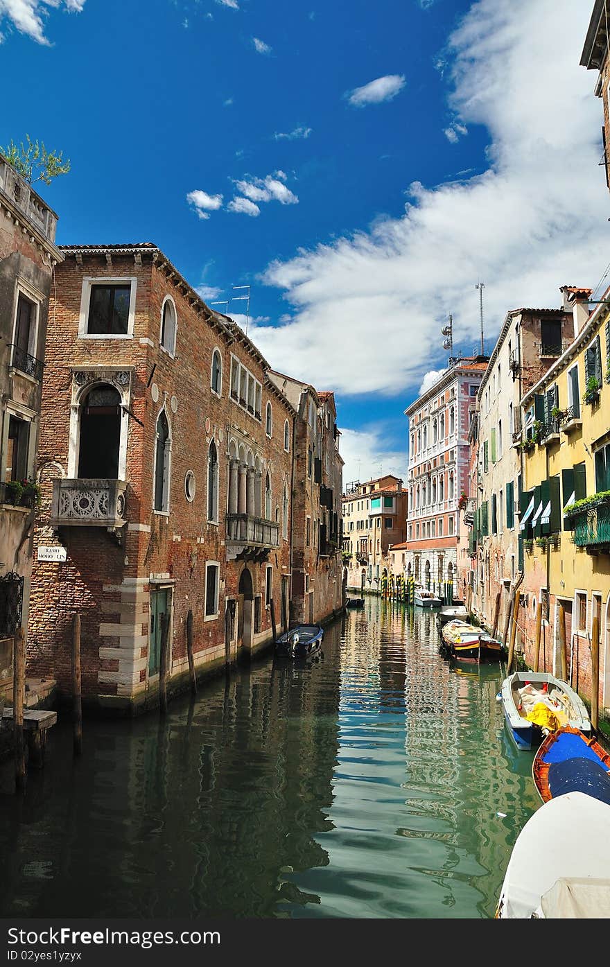 Classic view of Venice with canal and old buildings, Italy