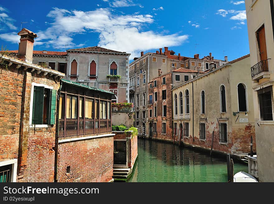 Classic view of Venice with canal and old buildings, Italy