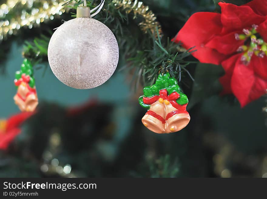 Detail of christmas tree with balls and bells