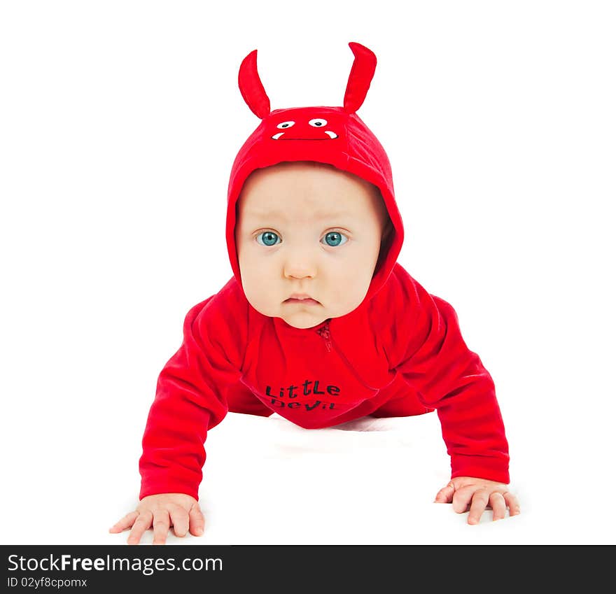 I'm a little devil! Cute half-year-old boy in costumes