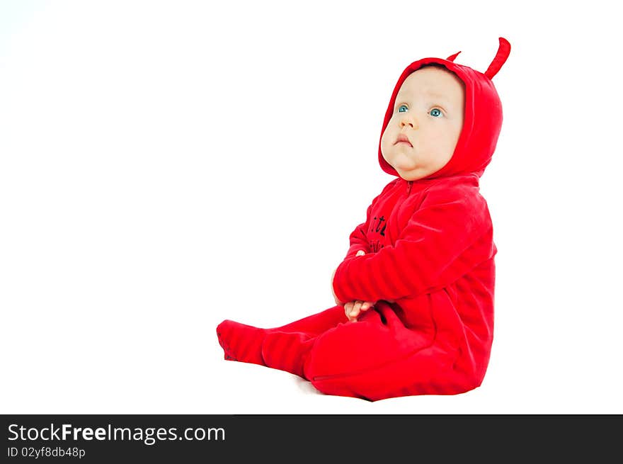 I'm a little devil! Cute half-year-old boy in costumes